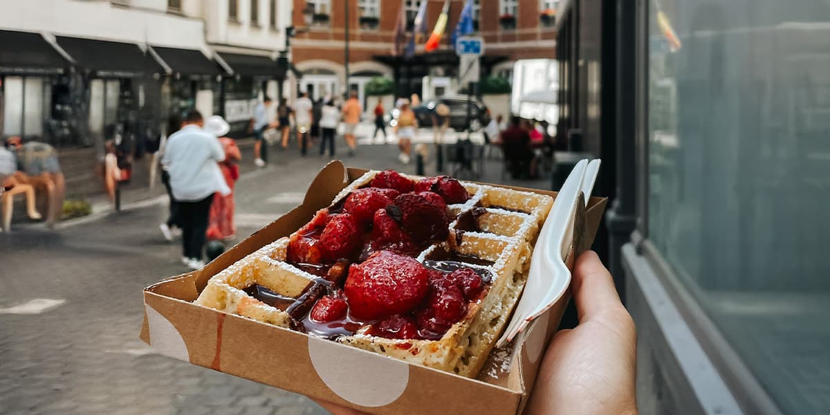 Belgium waffle with strawberries and chocolate