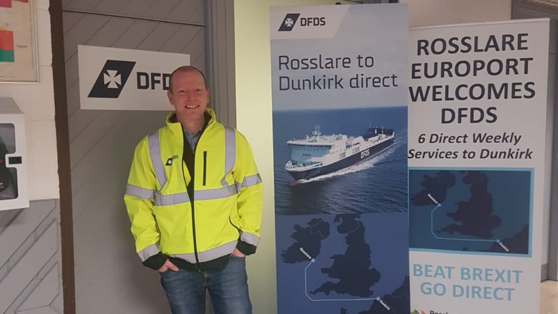 Dwain standing in front of the office