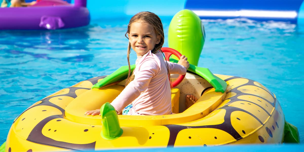 Camping in Europe - child in swimming pool