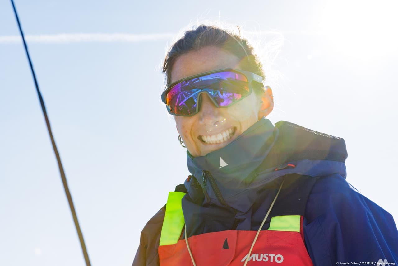 Pamela Lee smiling in the sun