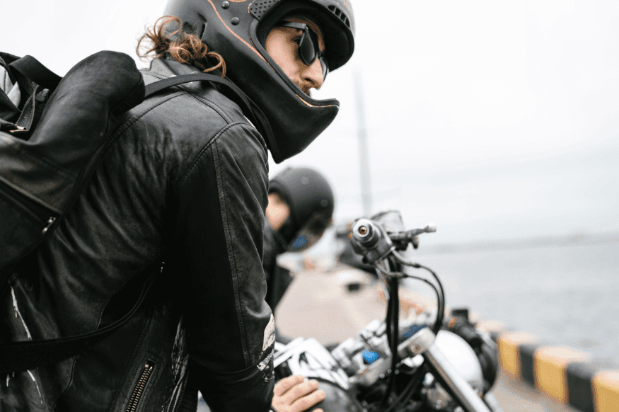 Motorcyclists by the water