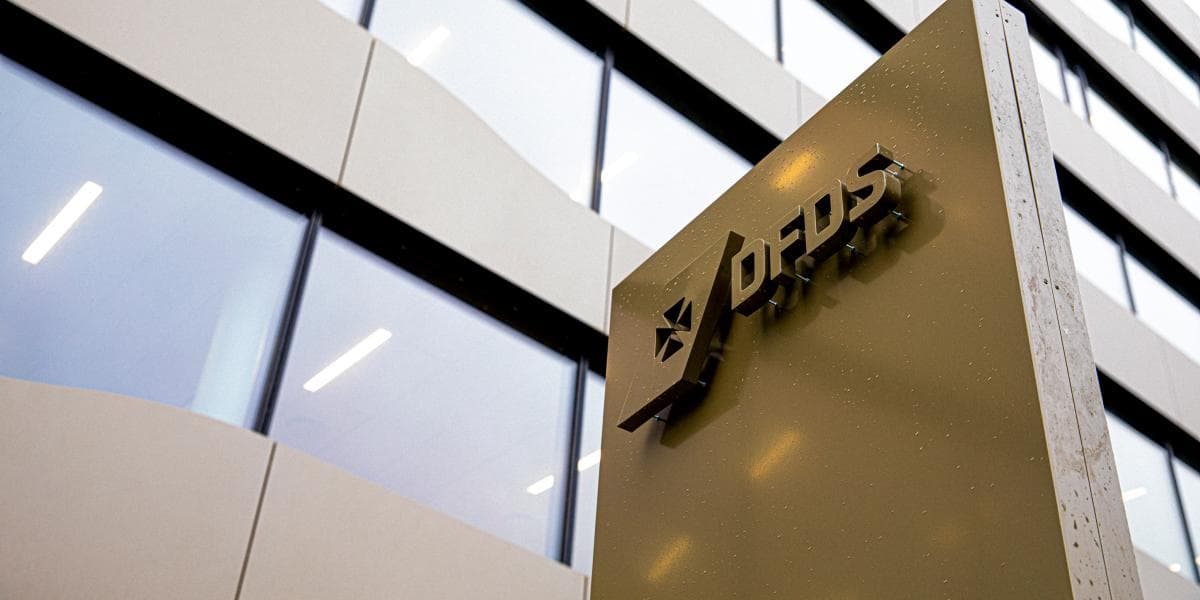 The brown DFDS sign with logo, as seen standing before DFDS HQ at Copenhagen, Denmark